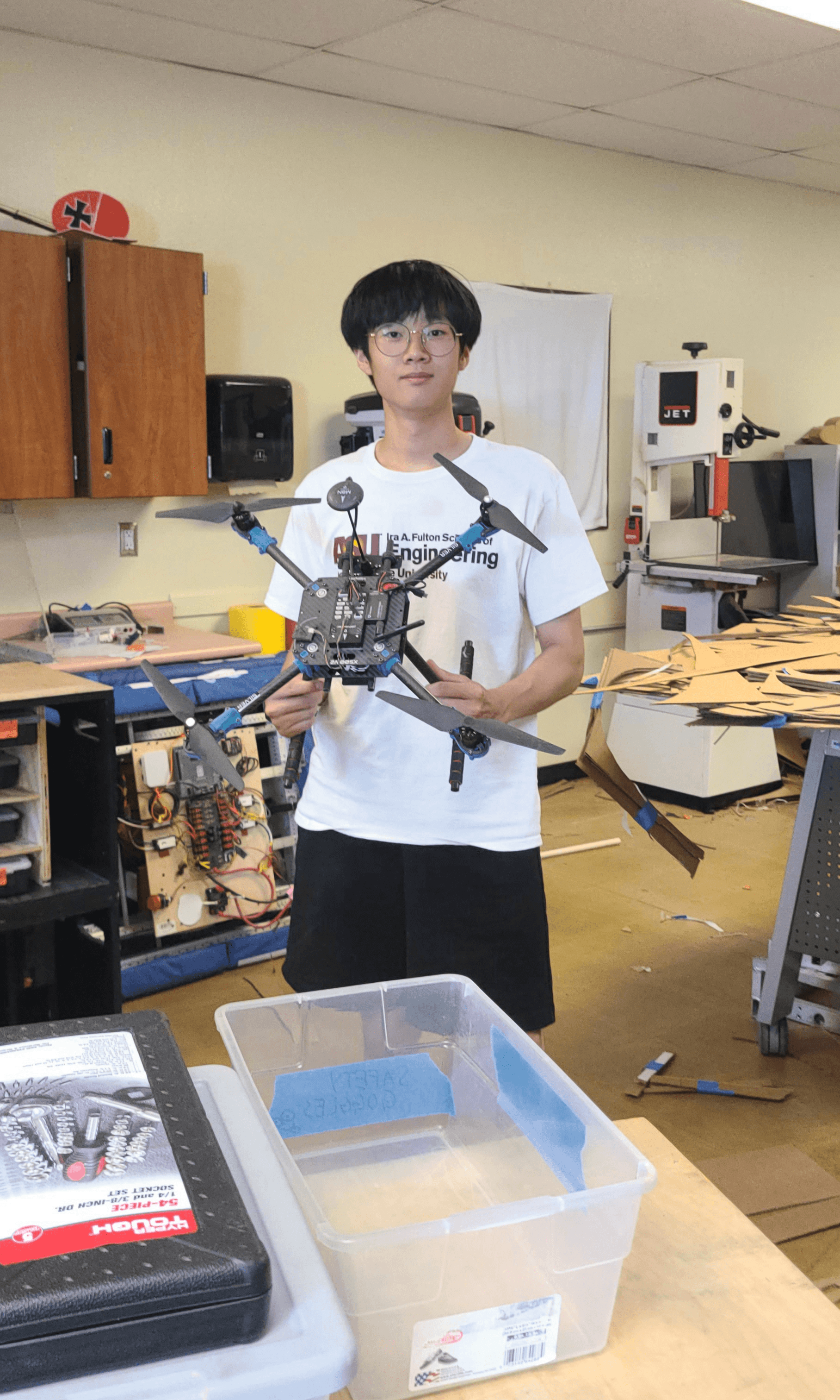 Brian holding a drone