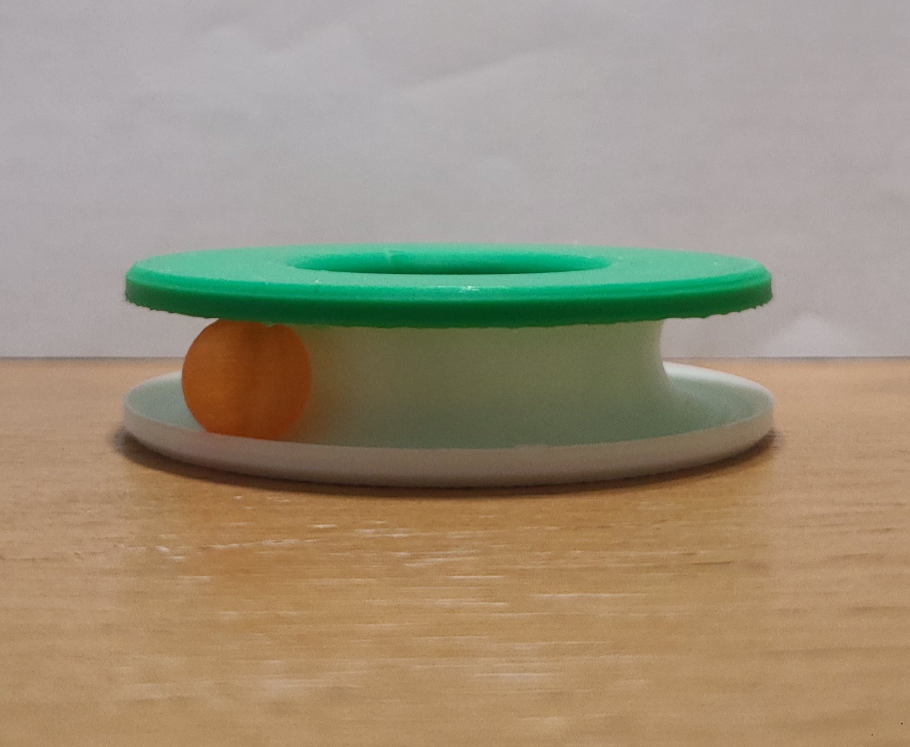 A 3D printed toy with a ball inside